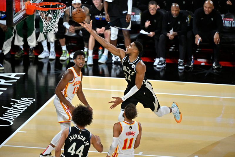 LAS VEGAS, NV - DECEMBER 14: Giannis Antetokounmpo #34 of the Milwaukee Bucks drives to the basket during the game against the Atlanta Hawks during the Emirates NBA Cup Semifinal game on December 14, 2024 at T-Mobile Arena in Las Vegas, Nevada. NOTE TO USER: User expressly acknowledges and agrees that, by downloading and/or using this Photograph, user is consenting to the terms and conditions of the Getty Images License Agreement. Mandatory Copyright Notice: Copyright 2024 NBAE (Photo by David Becker/NBAE via Getty Images)