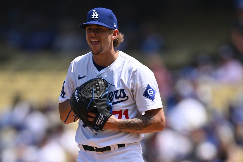 Apr 20, 2024; Los Angeles, California, USA; Los Angeles Dodgers pitcher Gavin Stone (71) reacts against the New York Mets during the first inning at Dodger Stadium. Mandatory Credit: Jonathan Hui-USA TODAY Sports