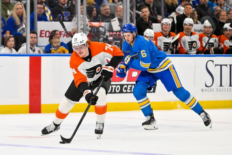 Nov 30, 2024; St. Louis, Missouri, USA;  Philadelphia Flyers right wing Owen Tippett (74) controls the puck against the St. Louis Blues during the first period at Enterprise Center. Mandatory Credit: Jeff Curry-Imagn Images