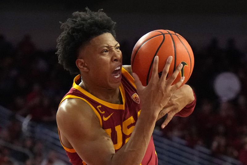 Jan 27, 2024; Los Angeles, California, USA; Southern California Trojans guard Boogie Ellis (5) attempts to catch the ball against the UCLA Bruins in the second half at Galen Center. Mandatory Credit: Kirby Lee-USA TODAY Sports