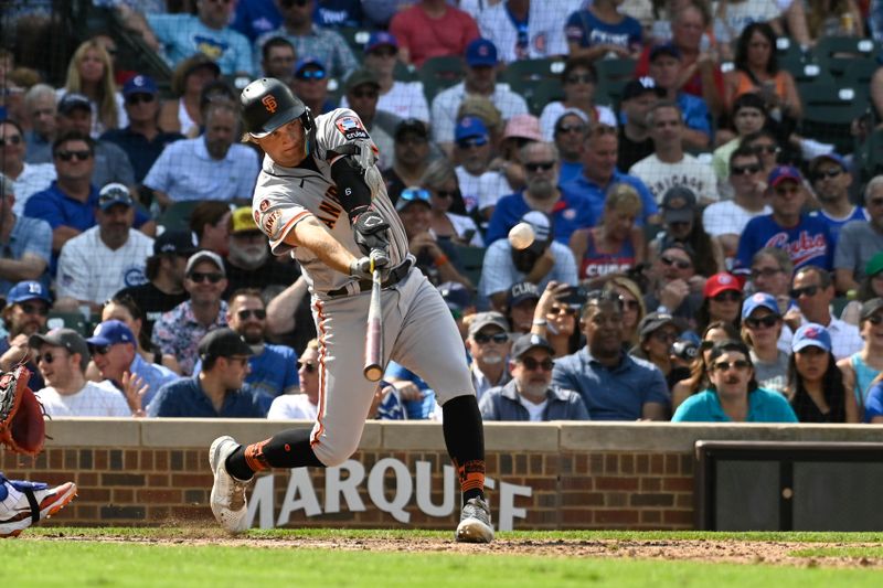 Sep 6, 2023; Chicago, Illinois, USA;  San Francisco Giants shortstop Casey Schmitt (6) hits an RBI double against the Chicago Cubs during the seventh inning at Wrigley Field. Mandatory Credit: Matt Marton-USA TODAY Sports