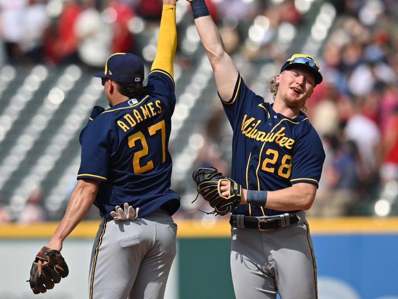 Jun 25, 2023; Cleveland, Ohio, USA; Milwaukee Brewers shortstop Willy Adames (27) and center fielder Joey Wiemer (28) celebrate after the Brewers beat the Cleveland Guardians at Progressive Field. Mandatory Credit: Ken Blaze-USA TODAY Sports