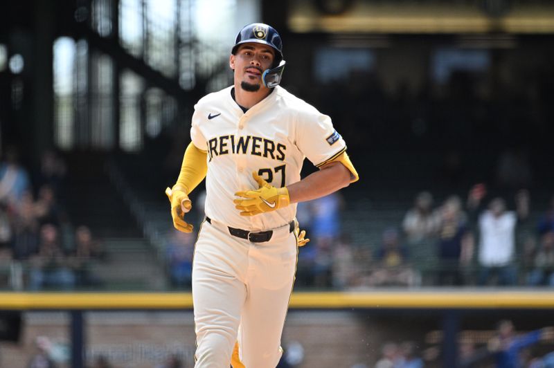May 1, 2024; Milwaukee, Wisconsin, USA; Milwaukee Brewers shortstop Willy Adames (27) rounds the bases after hitting a home run against the Tampa Bay Rays in the sixth inning at American Family Field. Mandatory Credit: Michael McLoone-USA TODAY Sports