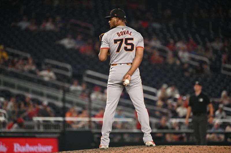 Aug 5, 2024; Washington, District of Columbia, USA; San Francisco Giants relief pitcher Camilo Doval (75) prepares to throw a pitch against the Washington Nationals during the ninth inning at Nationals Park. Mandatory Credit: Rafael Suanes-USA TODAY Sports