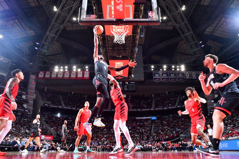 HOUSTON, TX - JANUARY 24: Jalen Green #4 of the Houston Rockets drives to the basket during the game against the Portland Trail Blazers on January 24, 2024 at the Toyota Center in Houston, Texas. NOTE TO USER: User expressly acknowledges and agrees that, by downloading and or using this photograph, User is consenting to the terms and conditions of the Getty Images License Agreement. Mandatory Copyright Notice: Copyright 2024 NBAE (Photo by Logan Riely/NBAE via Getty Images)