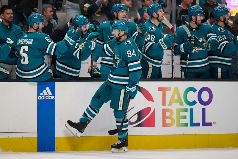 Jan 27, 2024; San Jose, California, USA; San Jose Sharks defenseman Jan Rutta (84) shakes hands with his teammates after scoring a goal against the Buffalo Sabres during the first period at SAP Center at San Jose. Mandatory Credit: Robert Edwards-USA TODAY Sports