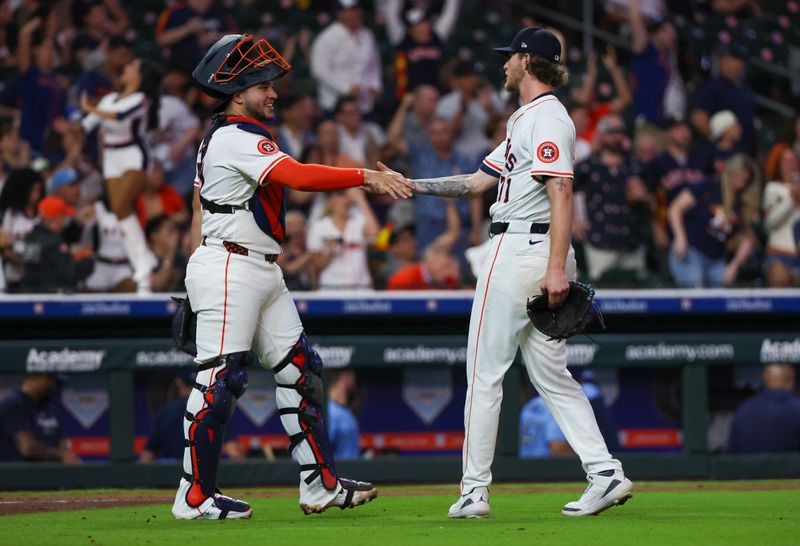 Apr 23, 2025; Houston, Texas, USA; Houston Astros catcher Yainer Diaz (21) shakes hands with relief pitcher Josh Hader (71) after defeating the Toronto Blue Jays at Daikin Park. Mandatory Credit: Thomas Shea-Imagn Images
