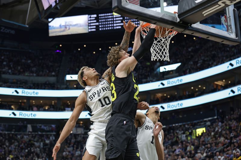 SALT LAKE CITY, UT - MARCH 27: Lauri Markkanen #23 of the Utah Jazz dunks the ball during the game against the San Antonio Spurs on March 27, 2024 at Delta Center in Salt Lake City, Utah. NOTE TO USER: User expressly acknowledges and agrees that, by downloading and or using this Photograph, User is consenting to the terms and conditions of the Getty Images License Agreement. Mandatory Copyright Notice: Copyright 2024 NBAE (Photo by Chris Nicoll/NBAE via Getty Images)