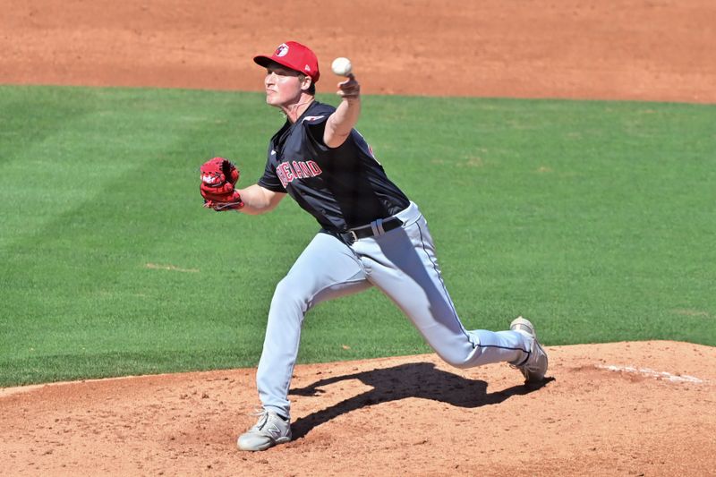 Feb 29, 2024; Tempe, Arizona, USA;  Cleveland Guardians relief pitcher Tim Herrin (29) throws in the third inning against the Los Angeles Angels during a spring training game at Tempe Diablo Stadium. Mandatory Credit: Matt Kartozian-USA TODAY Sports