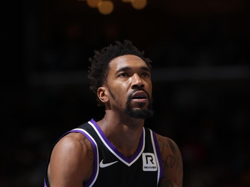 MEMPHIS, TN - DECEMBER 5: Malik Monk #0 of the Sacramento Kings prepares to shoot a free throw during the game against the Memphis Grizzlies on December 5, 2024 at FedExForum in Memphis, Tennessee. NOTE TO USER: User expressly acknowledges and agrees that, by downloading and or using this photograph, User is consenting to the terms and conditions of the Getty Images License Agreement. Mandatory Copyright Notice: Copyright 2024 NBAE (Photo by Joe Murphy/NBAE via Getty Images)