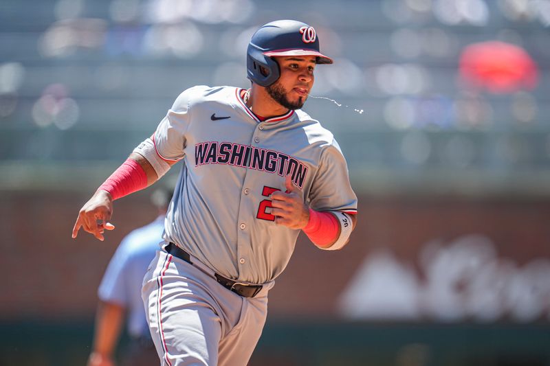 Aug 25, 2024; Cumberland, Georgia, USA; Washington Nationals designated hitter Keibert Ruiz (20) runs the bases against the Atlanta Braves during the seventh inning at Truist Park. Mandatory Credit: Dale Zanine-USA TODAY Sports