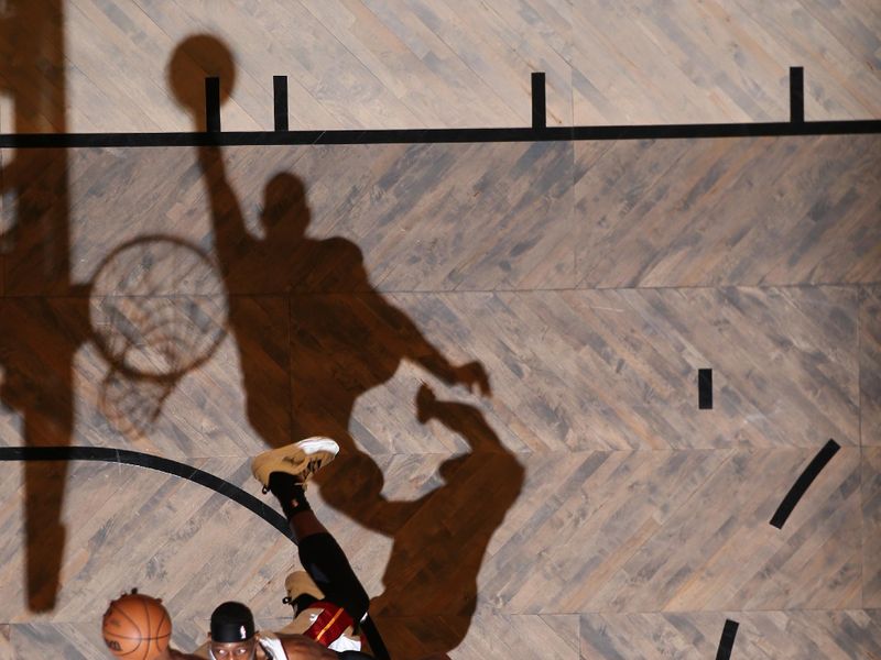 BROOKLYN, NY - JANUARY 15: Bam Adebayo #13 of the Miami Heat drives to the basket during the game against the Brooklyn Nets on January 15, 2024 at Barclays Center in Brooklyn, New York. NOTE TO USER: User expressly acknowledges and agrees that, by downloading and or using this Photograph, user is consenting to the terms and conditions of the Getty Images License Agreement. Mandatory Copyright Notice: Copyright 2024 NBAE (Photo by Nathaniel S. Butler/NBAE via Getty Images)