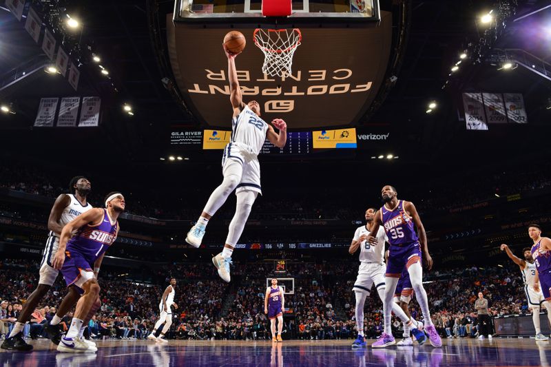 PHOENIX, AZ - JANUARY 7: Desmond Bane #22 of the Memphis Grizzlies shoots the ball during the game against the Phoenix Suns on January 7, 2024 at Footprint Center in Phoenix, Arizona. NOTE TO USER: User expressly acknowledges and agrees that, by downloading and or using this photograph, user is consenting to the terms and conditions of the Getty Images License Agreement. Mandatory Copyright Notice: Copyright 2024 NBAE (Photo by Barry Gossage/NBAE via Getty Images)