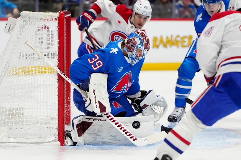 Nov 29, 2025; Denver, Colorado, USA; Colorado Avalanche goaltender Mackenzie Blackwood (39) makes a save  in the first period against the Montreal Canadiens at Ball Arena. Mandatory Credit: Ron Chenoy-Imagn Images