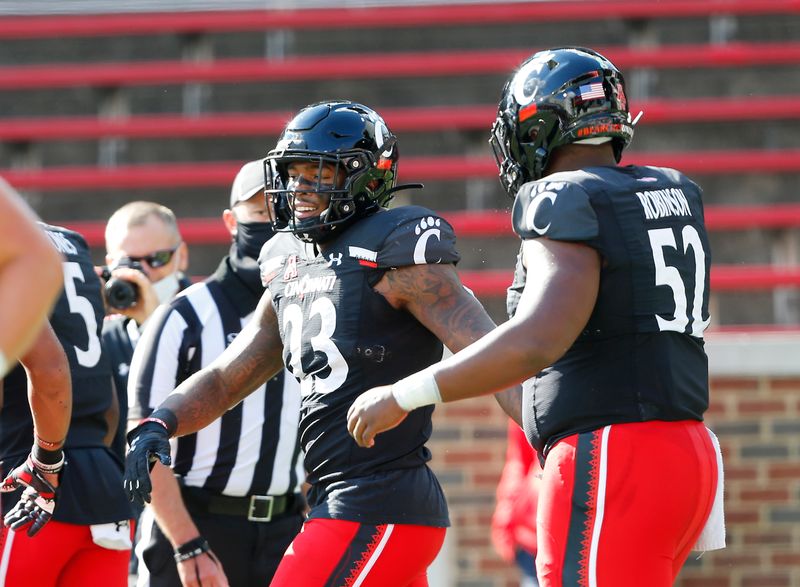 Oct 3, 2020; Cincinnati, OH, USA; Cincinnati Bearcats running back Gerrid Doaks (23) celebrates his touchdown during the first quarter against the South Florida Bulls at Nippert Stadium. Mandatory Credit: Joseph Maiorana-USA TODAY Sports