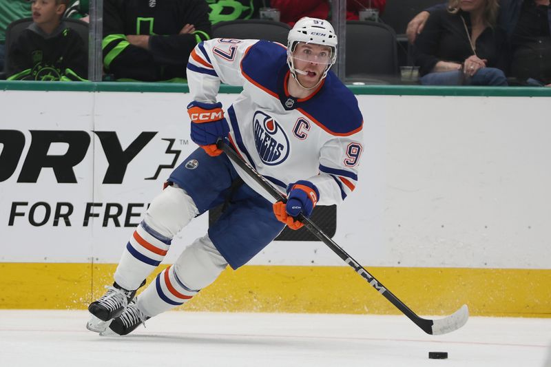 Oct 19, 2024; Dallas, Texas, USA; Edmonton Oilers center Connor McDavid (97) controls the puck against the Dallas Stars in the first period at American Airlines Center. Mandatory Credit: Tim Heitman-Imagn Images