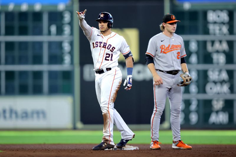 Sep 20, 2023; Houston, Texas, USA; Houston Astros catcher Yainer Diaz (21) reacts after hitting a double to right field against the Baltimore Orioles during the ninth inning at Minute Maid Park. Mandatory Credit: Erik Williams-USA TODAY Sports