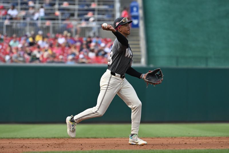 Aug 3, 2024; Washington, District of Columbia, USA; Washington Nationals third baseman Trey Lipscomb (38) throws towards first base after fielding a ground ball against the Milwaukee Brewers during the second inning at Nationals Park. Mandatory Credit: Rafael Suanes-USA TODAY Sports