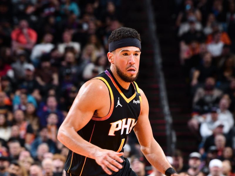 PHOENIX, AZ - DECEMBER 3: Devin Booker #1 of the Phoenix Suns dribbles the ball during the game against the San Antonio Spurs during a Emirates NBA Cup game on December 3, 2024 at Footprint Center in Phoenix, Arizona. NOTE TO USER: User expressly acknowledges and agrees that, by downloading and or using this photograph, user is consenting to the terms and conditions of the Getty Images License Agreement. Mandatory Copyright Notice: Copyright 2024 NBAE (Photo by Barry Gossage/NBAE via Getty Images)