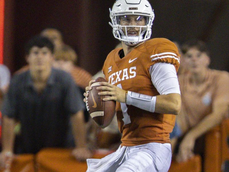 Sep 17, 2022; Austin, Texas, USA; Texas Longhorns quarterback Hudson Card (1) crops back to pass against the UTSA Roadrunners during the fourth quarter at Darrell K Royal-Texas Memorial Stadium. Mandatory Credit: John Gutierrez-USA TODAY Sports