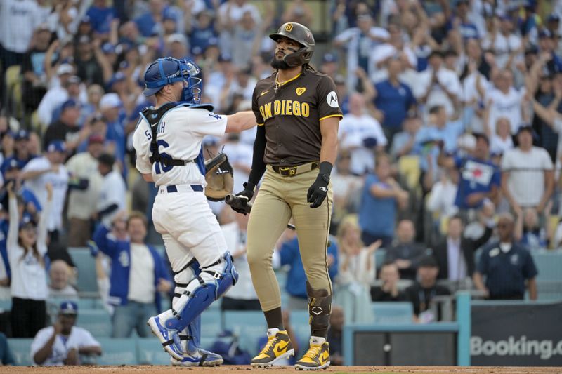 Oct 11, 2024; Los Angeles, California, USA; San Diego Padres outfielder Fernando Tatis Jr. (23) reacts after striking out in the first inning against the Los Angeles Dodgers during game five of the NLDS for the 2024 MLB Playoffs at Dodger Stadium. Mandatory Credit: Jayne Kamin-Oncea-Imagn Images
