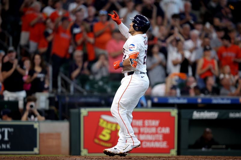 Aug 18, 2024; Houston, Texas, USA; Houston Astros catcher Yainer Diaz (21) crosses home plate after hitting a home run to left field against the Chicago White Sox during the sixth inning at Minute Maid Park. Mandatory Credit: Erik Williams-USA TODAY Sports