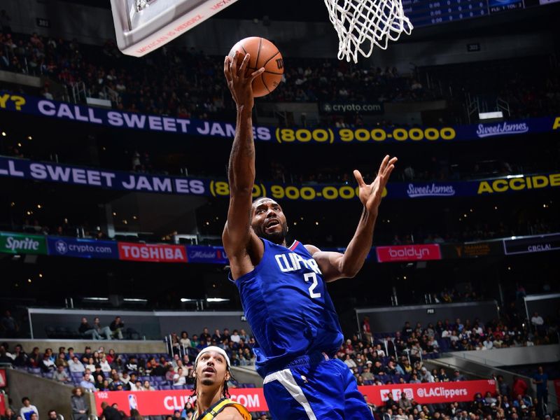 LOS ANGELES, CA - MARCH 25: Kawhi Leonard #2 of the LA Clippers drives to the basket during the game against the Indiana Pacers on March 25, 2024 at Crypto.Com Arena in Los Angeles, California. NOTE TO USER: User expressly acknowledges and agrees that, by downloading and/or using this Photograph, user is consenting to the terms and conditions of the Getty Images License Agreement. Mandatory Copyright Notice: Copyright 2024 NBAE (Photo by Adam Pantozzi/NBAE via Getty Images)