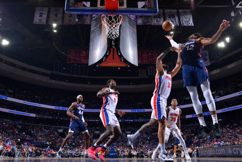 PHILADELPHIA, PA - APRIL 9: Tobias Harris #12 of the Philadelphia 76ers rebounds the ball during the game against the Detroit Pistons on April 9, 2024 at the Wells Fargo Center in Philadelphia, Pennsylvania NOTE TO USER: User expressly acknowledges and agrees that, by downloading and/or using this Photograph, user is consenting to the terms and conditions of the Getty Images License Agreement. Mandatory Copyright Notice: Copyright 2024 NBAE (Photo by Jesse D. Garrabrant/NBAE via Getty Images)