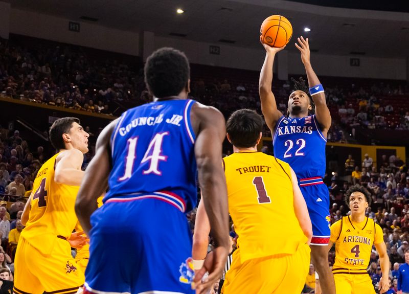 Mar 3, 2026; Tempe, Arizona, USA; Kansas Jayhawks guard Darryn Peterson (22) shoots the ball against the Arizona State Sun Devils in the first half at Desert Financial Arena. Mandatory Credit: Mark J. Rebilas-Imagn Images