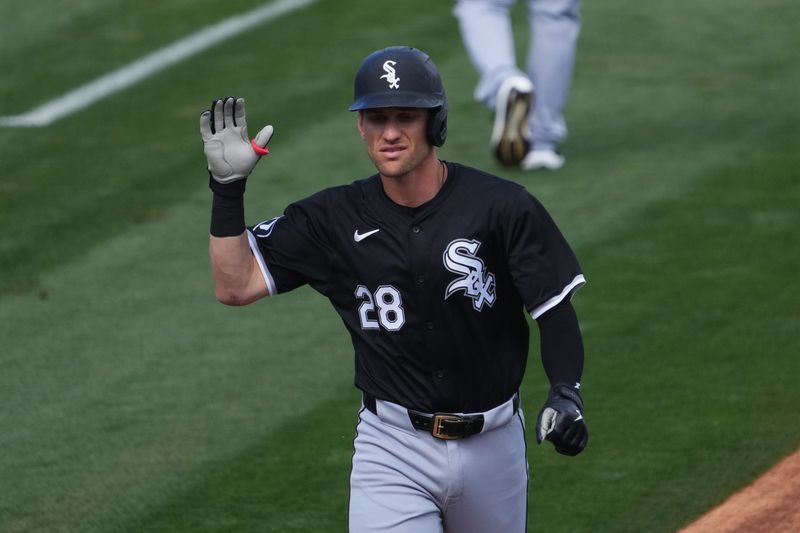 Mar 3, 2024; Tempe, Arizona, USA; Chicago White Sox third baseman Zach Remillard (28) approaches home plate after hitting a home run against the Los Angeles Angels during the third inning at Tempe Diablo Stadium. Mandatory Credit: Joe Camporeale-USA TODAY Sports