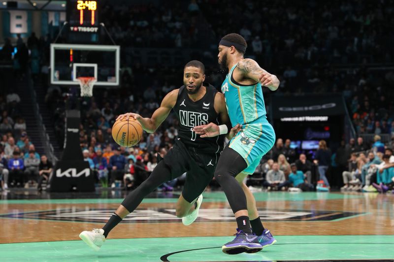 CHARLOTTE, NC - MARCH 9: Mikal Bridges #1 of the Brooklyn Nets handles the ball during the game against the Charlotte Hornets on March 9, 2024 at the Spectrum Center in Charlotte, North Carolina. NOTE TO USER: User expressly acknowledges and agrees that, by downloading and or using this photograph, User is consenting to the terms and conditions of the Getty Images License Agreement.  Mandatory Copyright Notice:  Copyright 2024 NBAE (Photo by Brock Williams-Smith/NBAE via Getty Images)