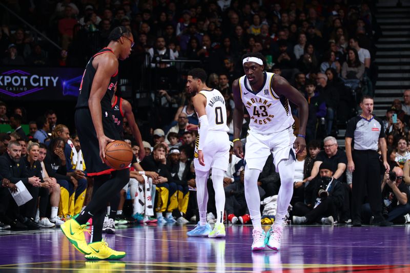 TORONTO, CANADA - DECEMBER 3: Pascal Siakam #43 of the Indiana Pacers plays defense during the game against the Toronto Raptors during the Emirates NBA Cup game on December 3, 2024 at the Scotiabank Arena in Toronto, Ontario, Canada.  NOTE TO USER: User expressly acknowledges and agrees that, by downloading and or using this Photograph, user is consenting to the terms and conditions of the Getty Images License Agreement.  Mandatory Copyright Notice: Copyright 2024 NBAE (Photo by Vaughn Ridley/NBAE via Getty Images)