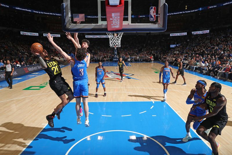 OKLAHOMA CITY, OK - MARCH 20: John Collins #20 of the Utah Jazz shoots the ball during the game against the Oklahoma City Thunder  on March 20, 2024 at Paycom Arena in Oklahoma City, Oklahoma. NOTE TO USER: User expressly acknowledges and agrees that, by downloading and or using this photograph, User is consenting to the terms and conditions of the Getty Images License Agreement. Mandatory Copyright Notice: Copyright 2024 NBAE (Photo by Zach Beeker/NBAE via Getty Images)