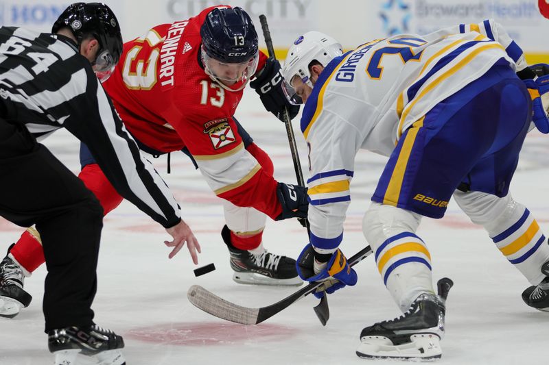 Feb 27, 2024; Sunrise, Florida, USA; Florida Panthers center Sam Reinhart (13) and Buffalo Sabres left wing Zemgus Girgensons (28) face-off during the second period at Amerant Bank Arena. Mandatory Credit: Sam Navarro-USA TODAY Sports