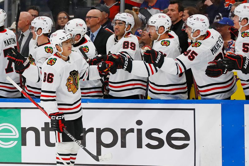 Oct 12, 2024; Edmonton, Alberta, CAN; The Chicago Blackhawks celebrate a goal scored by  forward Teuvo Teravainen (86) during the third period against the Edmonton Oilers at Rogers Place. Mandatory Credit: Perry Nelson-Imagn Images