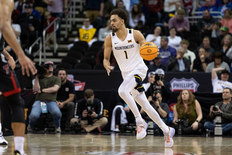 Mar 8, 2023; Kansas City, MO, USA; West Virginia Mountaineers forward Emmitt Matthews Jr. (1) dribbles the ball against the Texas Tech Red Raiders in the second half at T-Mobile Center. Mandatory Credit: Amy Kontras-USA TODAY Sports