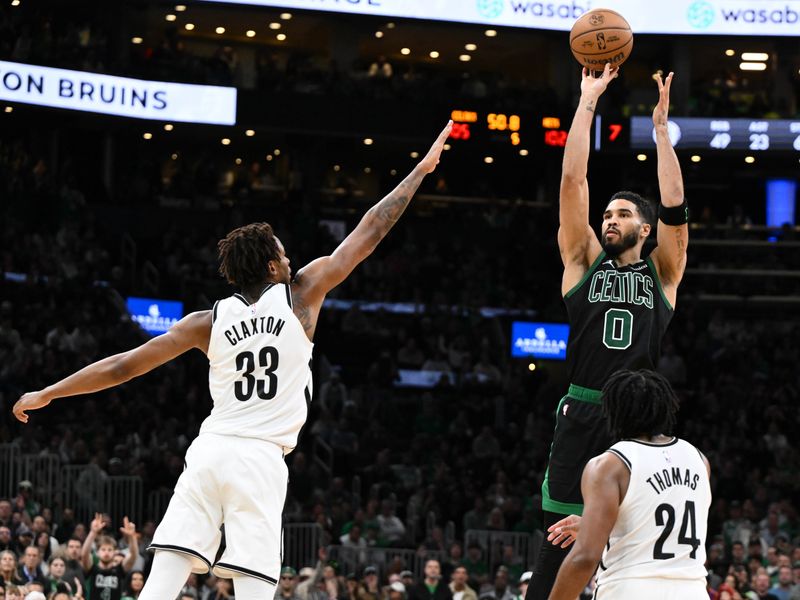 BOSTON, MASSACHUSETTS - NOVEMBER 08: Jayson Tatum #0 of the Boston Celtics attempts a three-point basket against the Brooklyn Nets during overtime at the TD Garden on November 08, 2024 in Boston, Massachusetts. NOTE TO USER: User expressly acknowledges and agrees that, by downloading and or using this photograph, User is consenting to the terms and conditions of the Getty Images License Agreement. (Photo by Brian Fluharty/Getty Images)