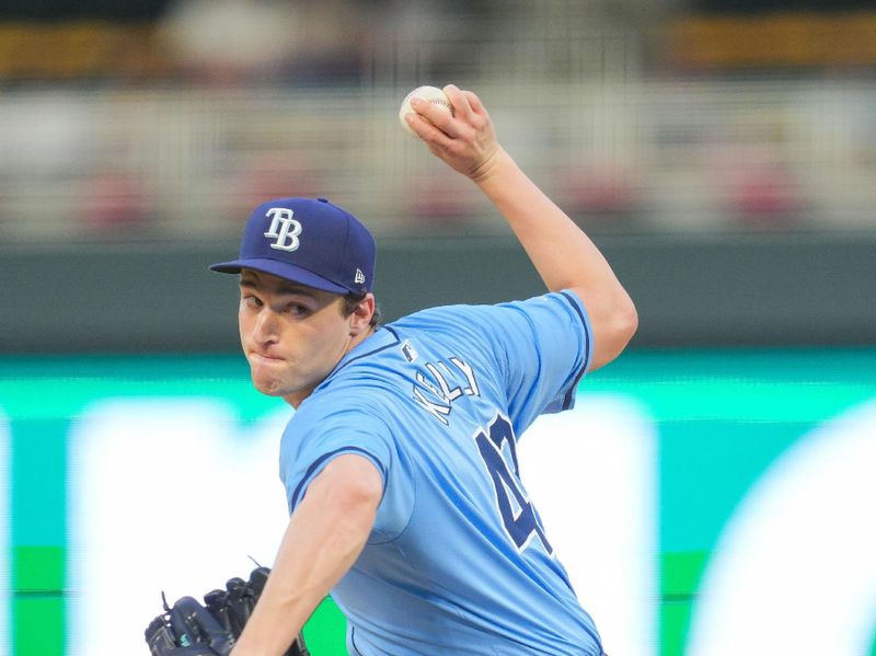 Jun 18, 2024; Minneapolis, Minnesota, USA; Tampa Bay Rays pitcher Kevin Kelly (49) pitches against the Minnesota Twins in the fourth inning at Target Field. Mandatory Credit: Brad Rempel-USA TODAY Sports