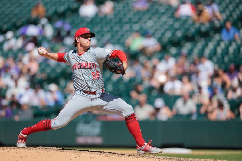 Jun 5, 2024; Denver, Colorado, USA; Cincinnati Reds relief pitcher Lucas Sims (39) delivers a pitch during the seventh inning against the Colorado Rockies at Coors Field. Mandatory Credit: Andrew Wevers-USA TODAY Sports