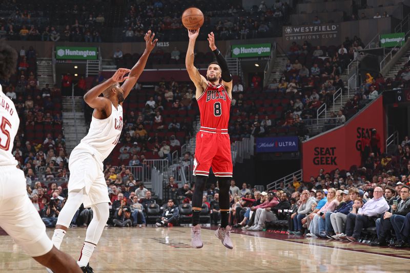 CLEVELAND, OH - OCTOBER 8: Zach LaVine #8 of the Chicago Bulls shoots a three point basket against the Cleveland Cavaliers on October 8, 2024 at Rocket Mortgage FieldHouse in Cleveland, Ohio. NOTE TO USER: User expressly acknowledges and agrees that, by downloading and/or using this Photograph, user is consenting to the terms and conditions of the Getty Images License Agreement. Mandatory Copyright Notice: Copyright 2024 NBAE (Photo by Jeff Haynes/NBAE via Getty Images)