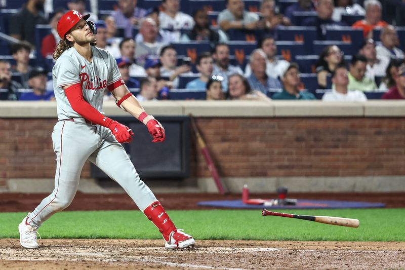 Sep 19, 2024; New York City, New York, USA;  Philadelphia Phillies third baseman Alec Bohm (28) reacts after popping out to end the seventh inning against the New York Mets at Citi Field. Mandatory Credit: Wendell Cruz-Imagn Images