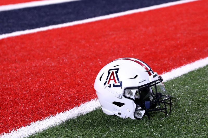 Sep 2, 2023; Tucson, Arizona, USA; Arizona Wildcats quarterback Jayden de Laura (7) helmet on the field after a victory over Northern Arizona Lumberjacks at Arizona Stadium. Mandatory Credit: Zac BonDurant-USA TODAY Sports