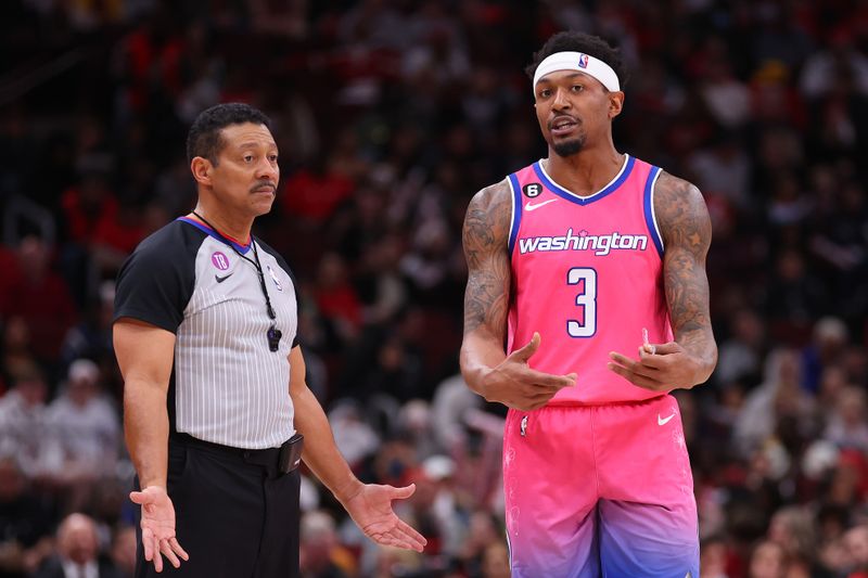 CHICAGO, ILLINOIS - FEBRUARY 26: Bradley Beal #3 of the Washington Wizards argues a foul call with referee Bill Kennedy #55 against the Chicago Bulls during the second half at United Center on February 26, 2023 in Chicago, Illinois. NOTE TO USER: User expressly acknowledges and agrees that, by downloading and or using this photograph, User is consenting to the terms and conditions of the Getty Images License Agreement.  (Photo by Michael Reaves/Getty Images)