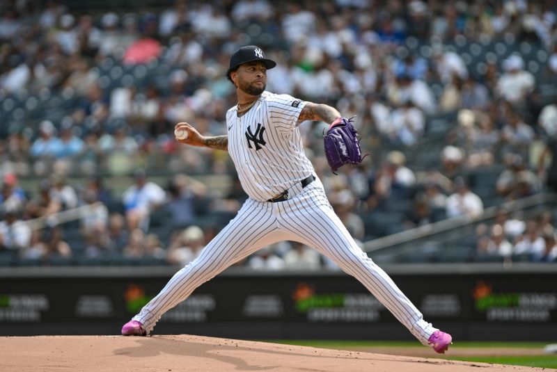 Sep 6, 2025; Bronx, New York, USA; New York Yankees pitcher Luis Gil (81) pitches against the Toronto Blue Jays during the first inning at Yankee Stadium. Mandatory Credit: John Jones-Imagn Images