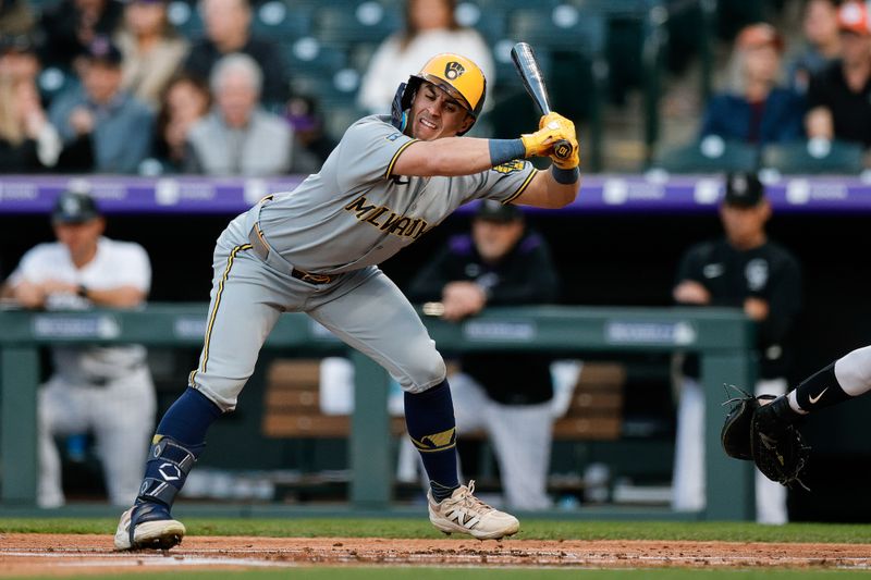 Apr 9, 2025; Denver, Colorado, USA; Milwaukee Brewers right fielder Sal Frelick (10) leans away from a pitch in the second inning against the Colorado Rockies at Coors Field. Mandatory Credit: Isaiah J. Downing-Imagn Images