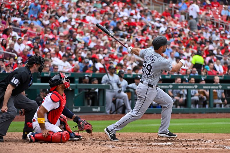 May 5, 2024; St. Louis, Missouri, USA;  Chicago White Sox shortstop Paul DeJong (29) hits a one run double against the St. Louis Cardinals during the seventh inning at Busch Stadium. Mandatory Credit: Jeff Curry-USA TODAY Sports