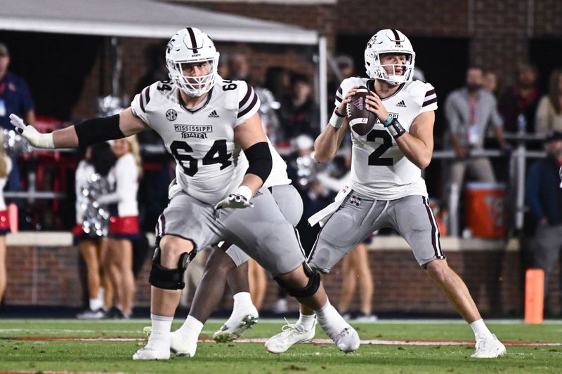 Nov 24, 2022; Oxford, Mississippi, USA; Mississippi State Bulldogs quarterback Will Rogers (2) looks to pass against the Ole Miss Rebels during the first quarter at Vaught-Hemingway Stadium. Mandatory Credit: Matt Bush-USA TODAY Sports