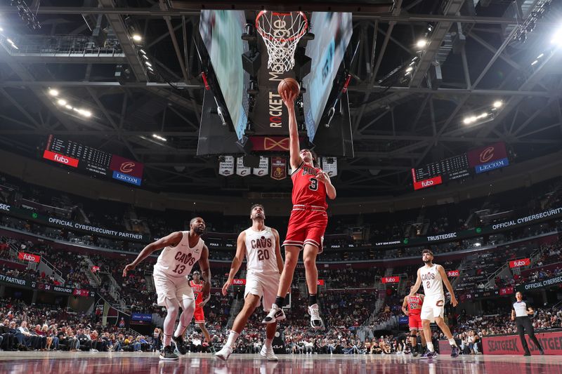 CLEVELAND, OH - OCTOBER 8: Josh Giddey #3 of the Chicago Bulls drives to the basket during the game against the Cleveland Cavaliers on October 8, 2024 at Rocket Mortgage FieldHouse in Cleveland, Ohio. NOTE TO USER: User expressly acknowledges and agrees that, by downloading and/or using this Photograph, user is consenting to the terms and conditions of the Getty Images License Agreement. Mandatory Copyright Notice: Copyright 2024 NBAE (Photo by Jeff Haynes/NBAE via Getty Images)