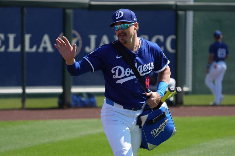 Mar 11, 2025; Phoenix, Arizona, USA; Los Angeles Dodgers third base Enrique Hernandez (8) waves to the fans before a game against the Cleveland Guardians at Camelback Ranch-Glendale. Mandatory Credit: Rick Scuteri-Imagn Images