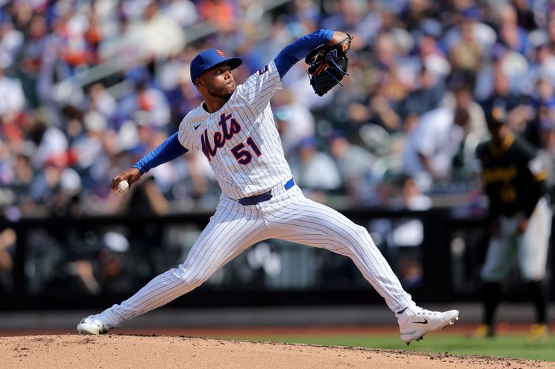 Mar 26, 2026; New York City, New York, USA; New York Mets starting pitcher Freddy Peralta (51) pitches against the Pittsburgh Pirates during the fourth inning at Citi Field. Mandatory Credit: Brad Penner-Imagn Images